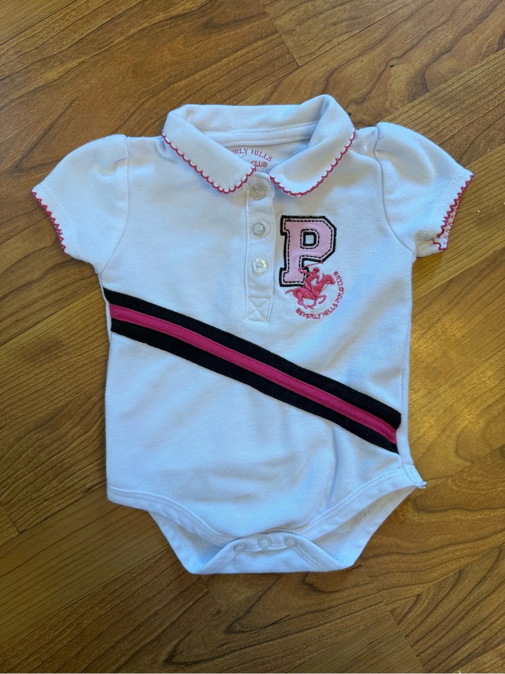 Beverly Hills Polo Club White Baby Onesie with Pink & Black Accents